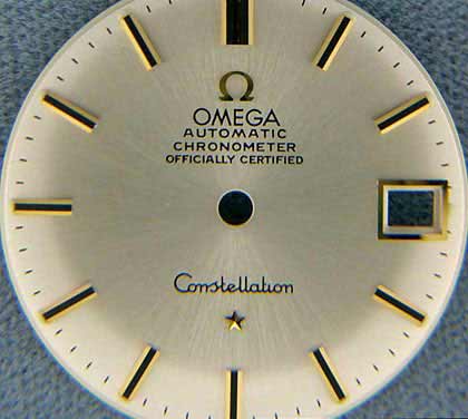  Omega 561 dial with brushed silver background rose gold tone markers with 